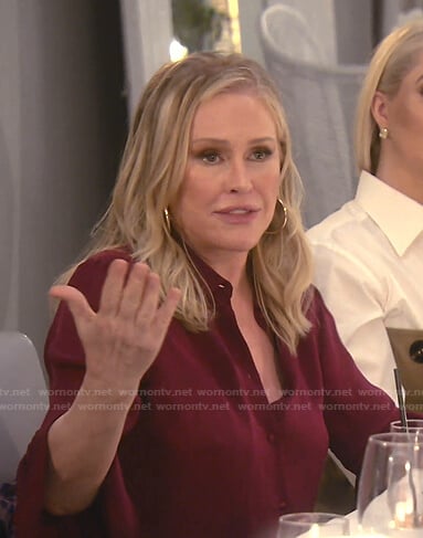 Kathy’s burgundy three quarter sleeve blouse on The Real Housewives of Beverly Hills