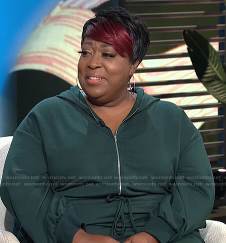 Loni’s green hooded jumpsuit on E! News Daily Pop