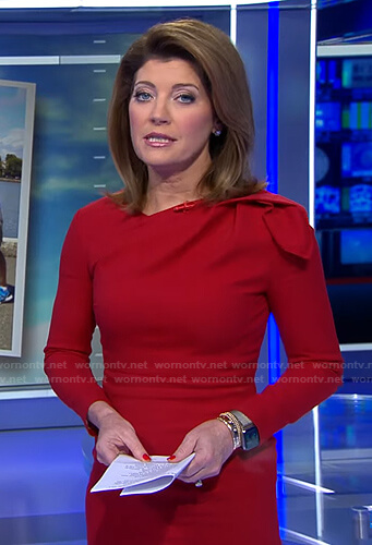 Norah’s red gathered shoulder dress on CBS Evening News