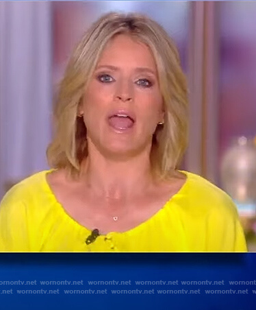 Sara’s yellow button down mini dress  on The View