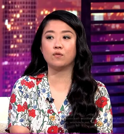 Sherry Cola’s white floral shirt on E! News Nightly Pop