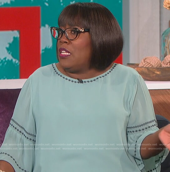 Sheryl’s blue embroidered trim top on The Talk