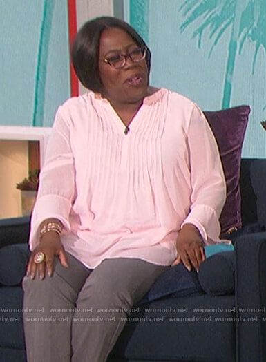 Sheryl’s pink pleated blouse on The Talk