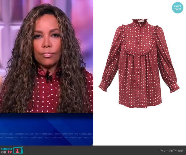 Ruffled high-neck polka-dot satin blouse by Zimmermann worn by Sunny Hostin on The View