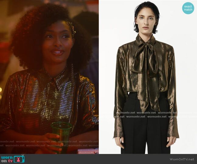 Bib-Front Metallic Striped Tie-Neck Blouse by Victoria Beckham worn by Zoey Johnson (Yara Shahidi) on Grown-ish