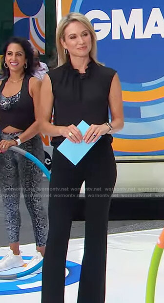 Amy's black ruffle neck sleeveless top and pants on Good Morning America