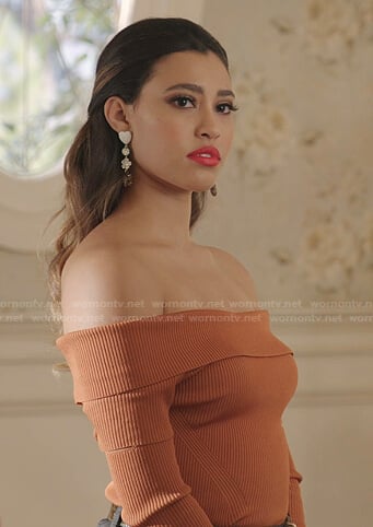 Eva's orange ribbed off-shoulder top on Dynasty