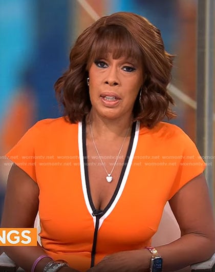 Gayle’s orange v-neck dress with black trim on CBS This Morning