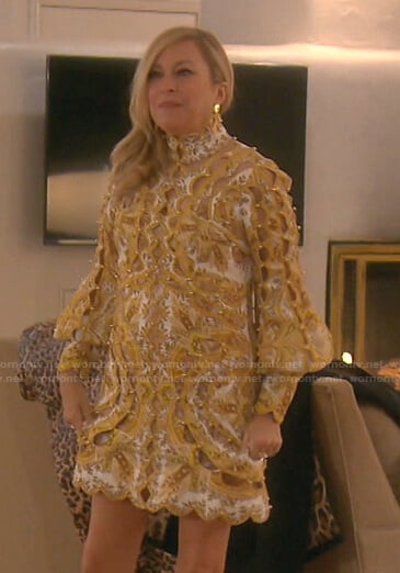 Sutton's yellow scalloped cutout dress on The Real Housewives of Beverly Hills