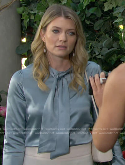 Tara's blue tie neck blouse on The Young and the Restless