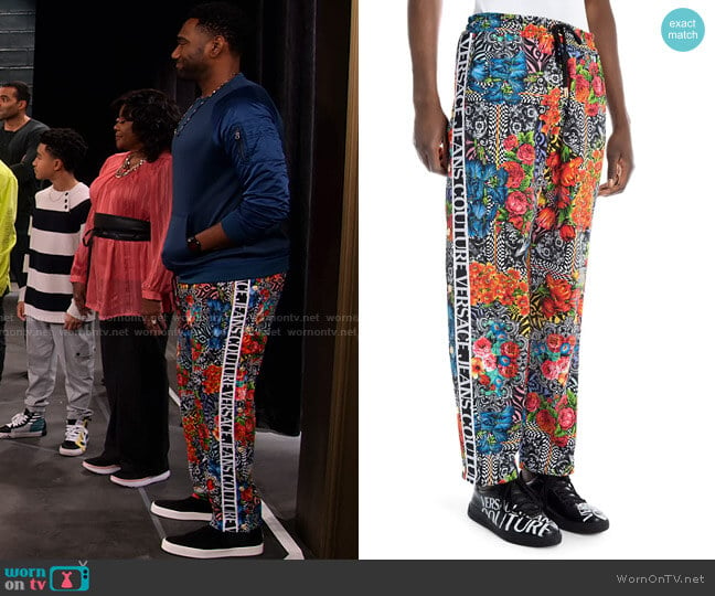 Logo Tape Floral Jogger by Versace worn by Moz McKellan (Anthony Alabi) on Family Reunion