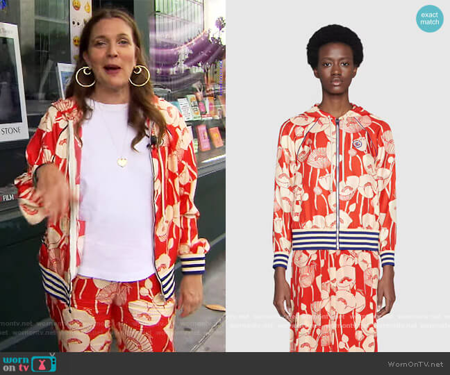 Poppy flowers print hooded jacket and pants by Gucci worn by Drew Barrymore on The Drew Barrymore Show