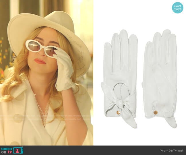 Helena bow-embellished leather gloves by Causse Gantier worn by Amanda Carrington (Eliza Bennett) on Dynasty