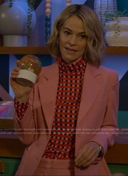 Alice's pink suit and checked turtleneck on The L Word Generation Q