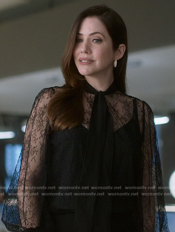 Andrea's black lace tie-neck blouse on Supergirl