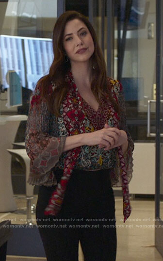 Andrea’s mixed print tie neck blouse on Supergirl