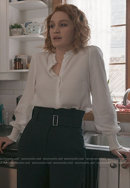 Corinne's white ruffle trim shirt and black belted trousers on The Republic of Sarah