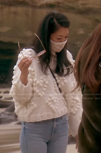 Crystal's white pom pom sweater on The Real Housewives of Beverly Hills