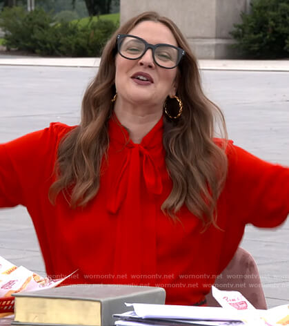Drew's red tie neck blouse on The Drew Barrymore Show