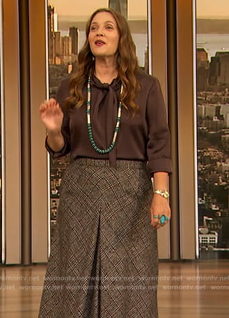 Drew's brown tie neck silk blouse on The Drew Barrymore Show