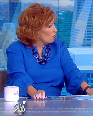 Joy’s blue split neck blouse on The View