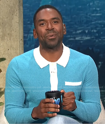 Justin’s blue and white long sleeve polo shirt on E! News Daily Pop