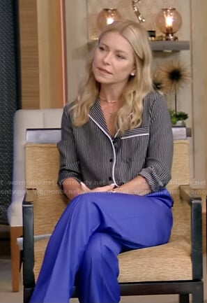 Kelly's black striped shirt and blue pants on Live with Kelly and Ryan