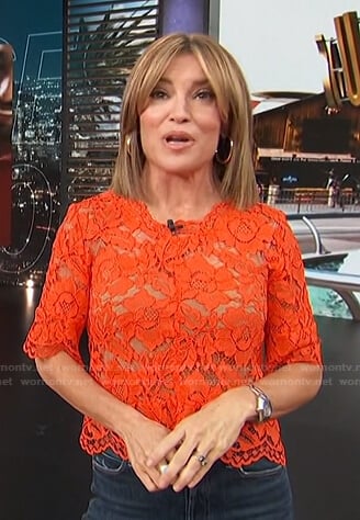 Kit's red floral lace top on Access Hollywood