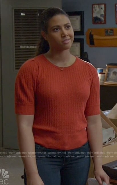 Kylie's orange knit top on Chicago Fire