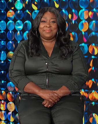 Loni’s grey smocked waist jumpsuit on E! News