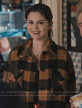 Mabel's buffalo check jacket and earrings on Only Murders in the Building