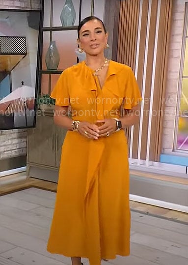 Michelle Miller's orange ruffled midi dress on CBS Mornings