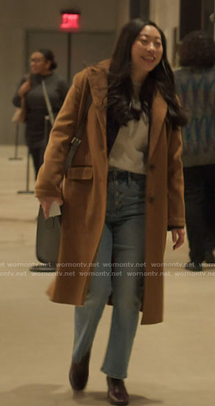 Nora's camel coat on Awkwafina is Nora From Queens