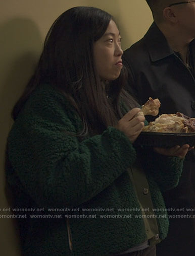 Nora's green fleece jacket on Awkwafina is Nora From Queens