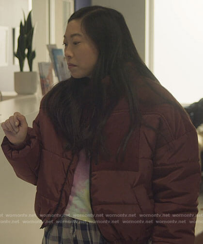 Nora's red puffer jacket with corduroy panels on Awkwafina is Nora From Queens