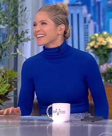 Sara’s blue turtleneck top and skirt on The View