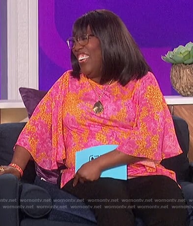 Sheryl’s pink floral top on The Talk