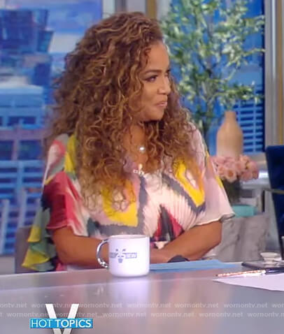 Sunny’s tie dye printed ruffle dress on The View