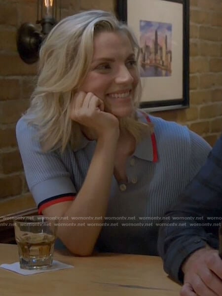 Sylvie’s blue polo top with red trim on Chicago Fire