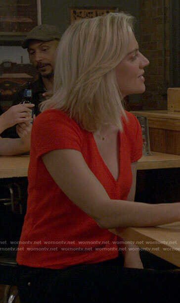 Sylvie’s red wrap top on Chicago Fire