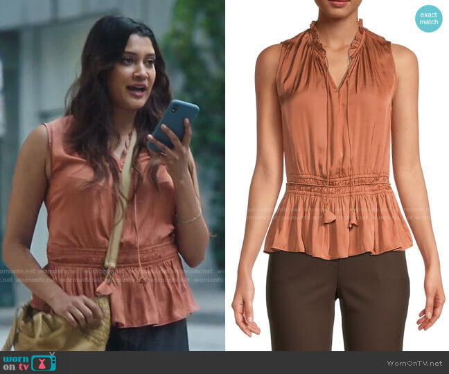 Ruffle Tie-Neck Peplum Top by T Tahari worn by Leela Devi (Anuja Joshi) on The Resident