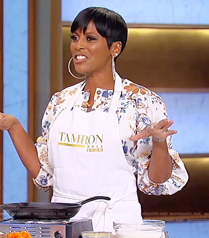 Tamron’s white floral belted jumpsuit on Tamron Hall Show