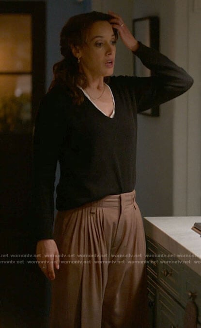 Bette’s pleated trousers and black v-neck sweater on The L Word Generation Q