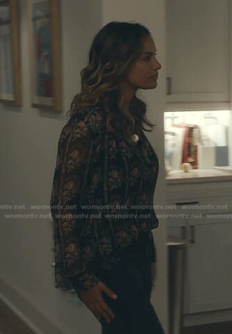 Billie’s black floral blouse on The Resident