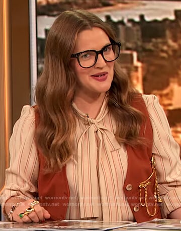 Drew’s striped tie neck blouse and vest on The Drew Barrymore Show