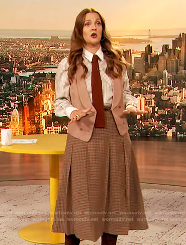 Drew’s stripe blouse and check skirt on The Drew Barrymore Show