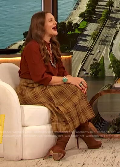 Drew’s red silk blouse and plaid skirt on The Drew Barrymore Show