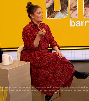 Drew’s red lip print blouse and skirt on The Drew Barrymore Show