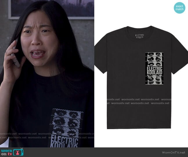 Nora’s black Electric Koolaid t-shirt on Awkwafina is Nora From Queens