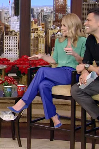 Kelly’s green blouse and blue pants on Live with Kelly and Ryan